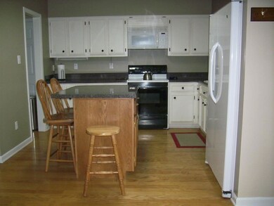 Convenient island, lots of cabinets and counter sp