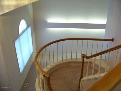 Staircase landing looking at living room