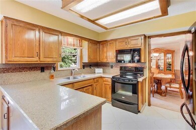 Updated Kitchen.  Refinished cabinets, granite cou