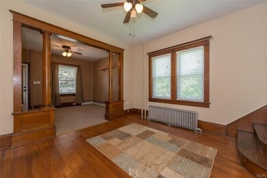 Dining room with hardwood flooring