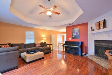 Living Room with Vaulted Ceilings, Wood Burning Fi