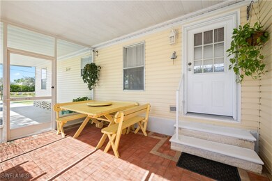 Sunroom featuring entry steps