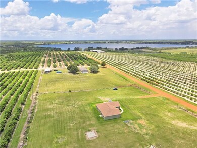 Aerial view of property with Lake Easy in the back