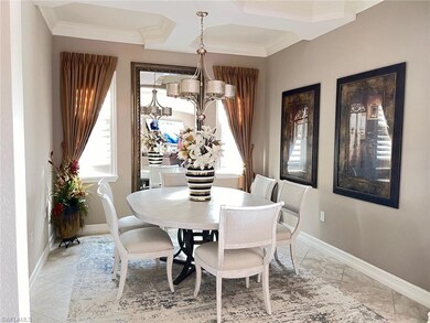 Dining room featuring crown molding and an invitin
