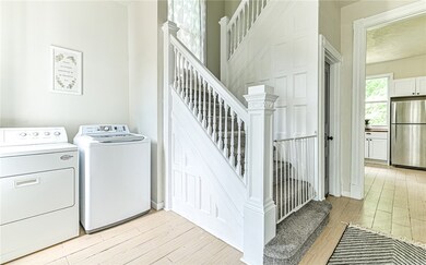 The beautiful woodwork in the hallway creates an a
