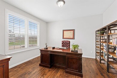 The front office with 9' ceilings and hand-scraped