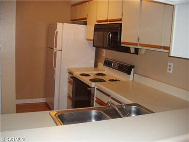 Kitchen - Galley Kitchen with breakfast bar.  Open