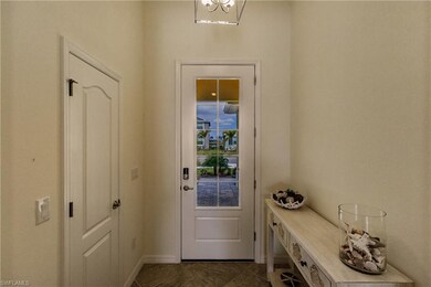 Inviting front foyer with Tile on the diagonal thr