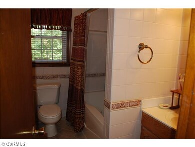 Bathroom - Renovated bath with custom tilework and
