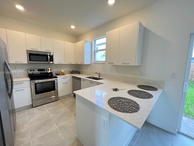 12612 NW 23rd Place, Miami Shores, FL 33167 - photo 3