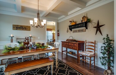 Formal dining area is located conveniently close to the kitchen 