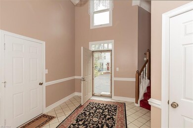 Looking out at door on right to basement, door on 