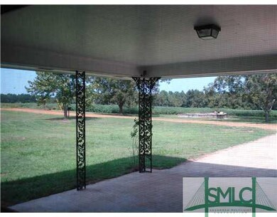 Exterior Front. Attached carport