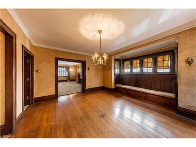 Formal Dining Room; Built in window bench has stor
