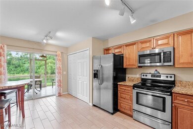 4965 Sandra Bay Dr unit 103, Naples, FL 34109 - photo 2