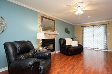 THE FOCAL POINT IN THE FAMILY ROOM IS A GORGEOUS S