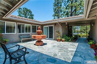 Enlarged and remodeled with security gated atrium 
