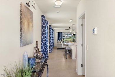 Front entry hallway, garage to the right