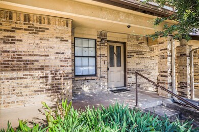 Property entrance with brick siding