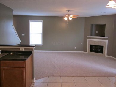 The great room is large and open.  It has a gas lo