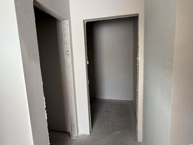 Hallway with concrete floors