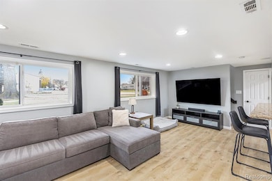 Living room with light wood floors