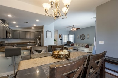 Dining room featuring a chandelier, wood finished