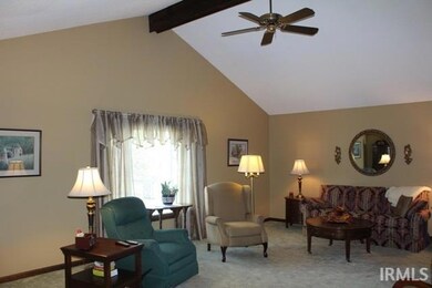 Living Room boasts beamed ceiling