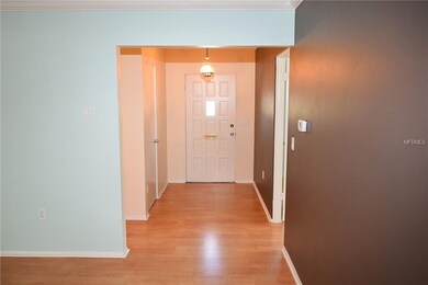 Front foyer with coat closet, master bedroom (righ
