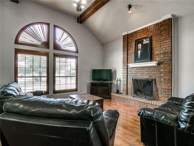 Wood burning fireplace & plantation shutters.
