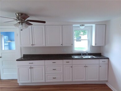 NEW COUNTER TOPS AND CABINETS.