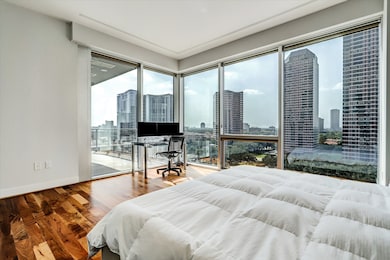 Over Sized Primary Bedroom, Floor to Ceiling Windows with Roller Shades.