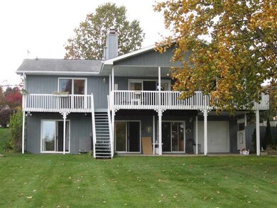 Exterior Back. Notice how the window scaping takes