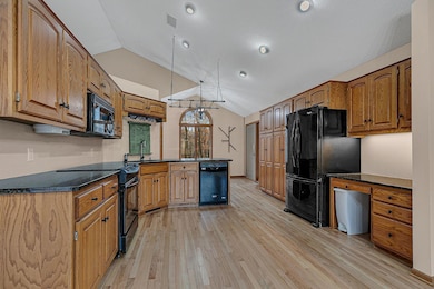 Vaulted ceilings over kitchen