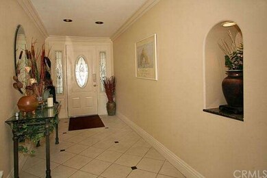 Entry way, newer front door, niche for art
