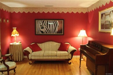 Formal Living Room With Hardwood Floors