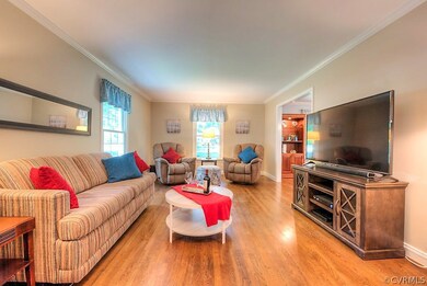 Spacious Living Room w.hardwood floors & lots of l
