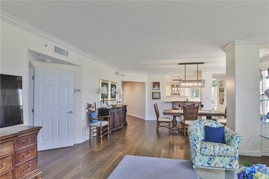 Living room view toward dining room and kitchen