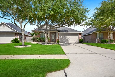 Offers a long double driveway up to the 2 car garage.