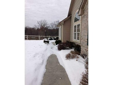 Exterior Front. Sidewalk from garage toward front 