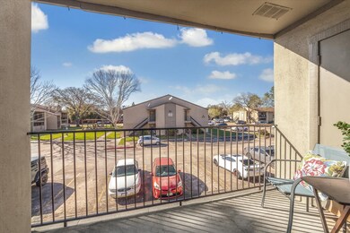 Front Balcony view with convenient Storage Closet.