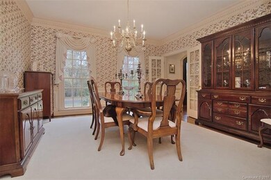 Large dining room has plenty of space for all your