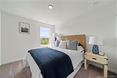 Bedroom featuring carpet flooring