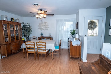 Dining space featuring light wood finished floors