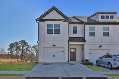 View of front of property with an attached garage,
