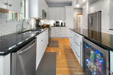 Plenty of cabinetry with under-counter wine fridge