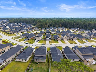 35425 Woodtrace Cir, Pinehurst, TX 77362 - photo 3