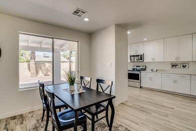 Dining open to kitchen