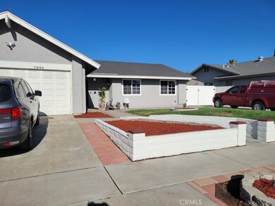 Driveway in front of two-car garage.