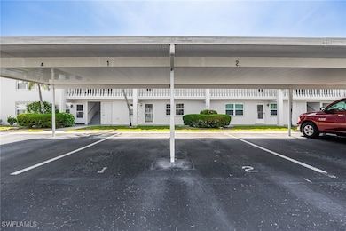 Covered parking lot featuring stairs